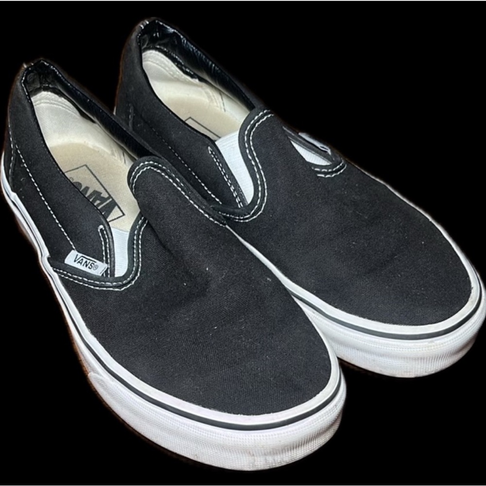 Vans Classic Black and White Slip-Ons